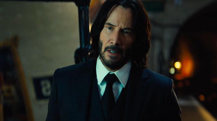 'John Wick' director puts 'temporary' brakes on film's future