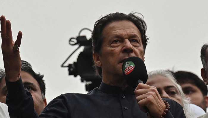 PTI Chairman Imran Khan addressing a his partys long march last year. — AFP/File