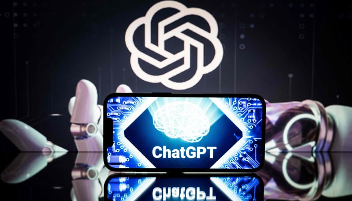 This picture was taken on January 23, 2023, in Toulouse, southwestern France, and shows screens displaying the logos of OpenAI and ChatGPT. — AFP