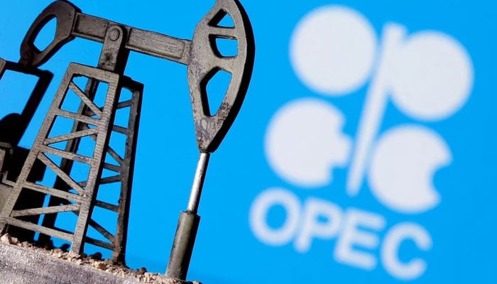 A 3D-printed oil pump jack is seen in front of the displayed OPEC logo in this illustration picture, April 14, 2020. —Reuters