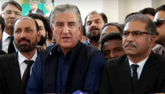 PTI Vice Chairman Shah Mehmood Qureshi addresses media outside Supreme Court on April 4.