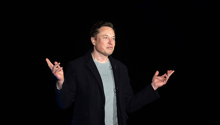 In this file photo taken on February 10, 2022 Elon Musk gestures as he speaks during a press conference at SpaceX´s Starbase facility near Boca Chica Village in South Texas. AFP