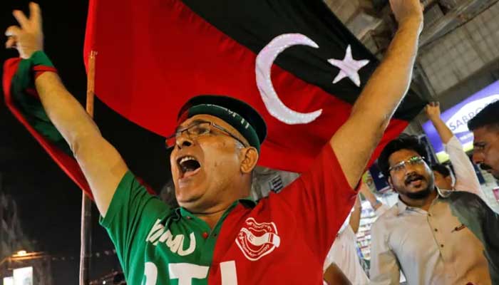 PTI supporters celebrate partys victory in 2018 general elections in Karachi. — Reuter/File