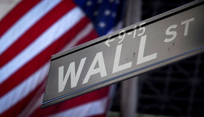 A Wall Street sign is pictured outside the New York Stock Exchange in New York.— Reuters/File