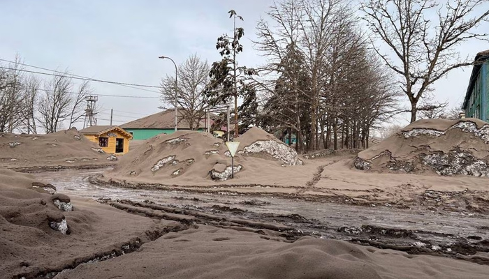 A view shows a street covered in volcanic dust following the eruption of the Shiveluch volcano in the settlement of Klyuchi on the Kamchatka Peninsula, Russia April 11, 2023. — Reuters