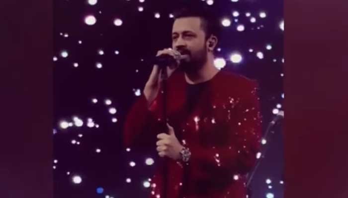 Atif Aslam sings on a mic at Anant Ambanis birthday. — Instagram