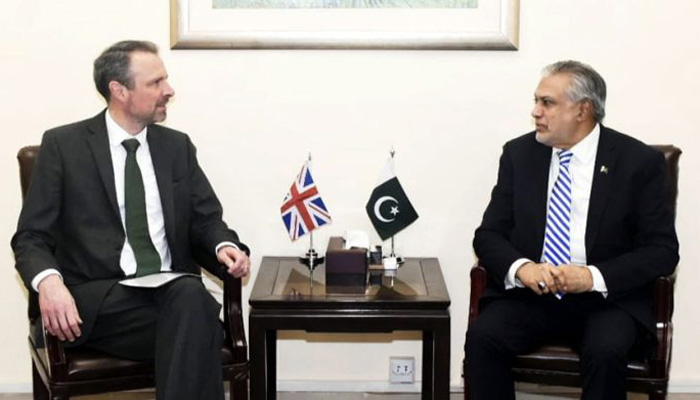 Acting British High Commissioner Andrew Dalgleish (left) calls on Finance Minister Ishaq Dar, on April 12, 2023. — APP