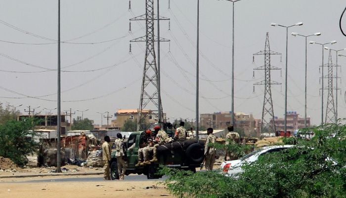 Army soldiers deploy in Khartoum on April 15, 2023, amid reported clashes in the city.— AFP