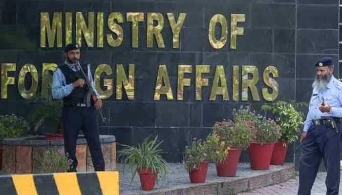 Security guards stand outside the Ministry of Foreign Affairs in Islamabad. — AFP/File