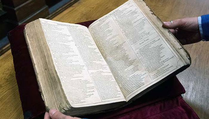 French librarian Remy Cordonnier displays a copy of William Shakespeares First Folio, on November 25, 2014 in Saint-Omer. AFP/File