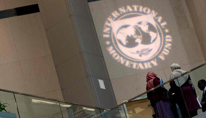 People attend the 2023 spring meetings inside the International Monetary Fund in Washington, US, April 12, 2023. — AFP/File