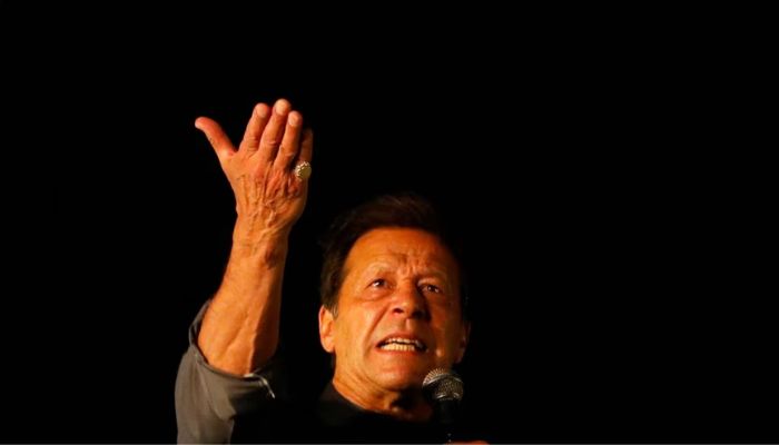 Ousted Pakistani Prime Minister Imran Khan gestures as he addresses supporters during a rally, in Karachi, Pakistan April 16, 2022.— Reuters