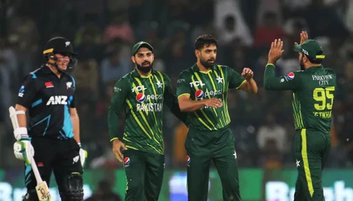 Haris Rauf (centre) celebrates with Shahdab Khan (Left) after taking Tom Lathans wicket during the match against New Zealand on April 14, 2023. — PCB