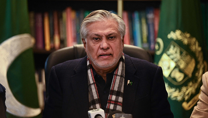 Finance Minister Ishaq Dar speaks during a press conference in Islamabad on February 10, 2023. — AFP