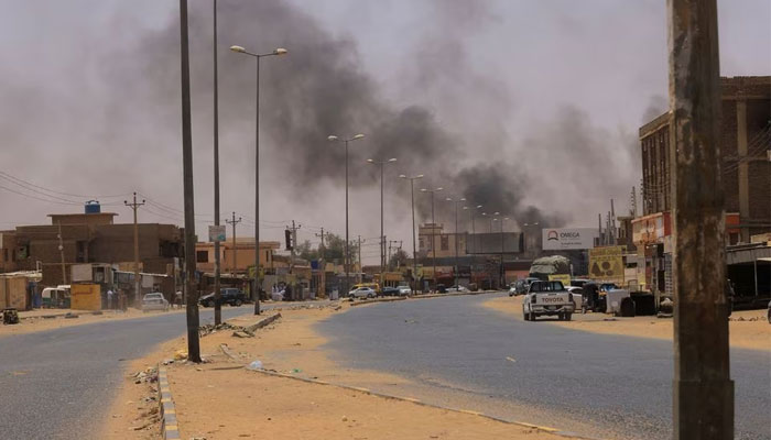 Smoke rises in Omdurman, near Halfaya Bridge, during clashes between the Paramilitary Rapid Support Forces and the army as seen from Khartoum North, Sudan April 15, 2020. — Reuters