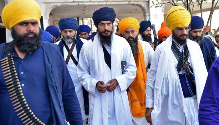 Amritpal Singh, a radical Sikh leader, leaves the holy Sikh shrine of the Golden Temple along with his supporters, in Amritsar, India, March 3, 2023.
