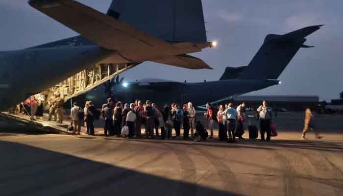 Italian citizens board an Italian Air Force C130 aircraft during their evacuation from Khartoum, Sudan, in this undated photo obtained by Reuters on April 24, 2023. — Reuters