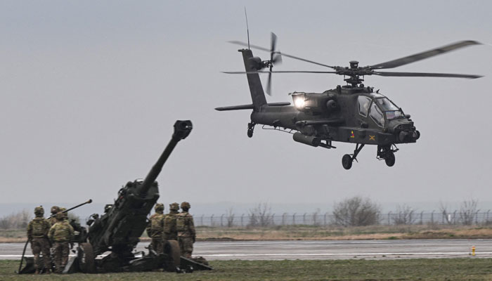 An Apache helicopter takes off during a demonstration as part of the rotation of US troops of the US Army 101 Airborne division at Mihail Kogalniceanu Air Base (RoAF 57th Air Base) near Constanta, Romania. — AFP/File