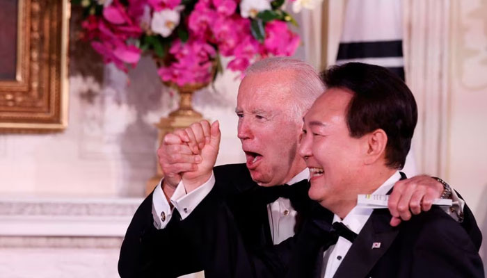 US President Joe Biden and South Koreas President Yoon Suk Yeol react at an official State Dinner, during Yoon Suk Yeols visit, at the White House in Washington, U.S. April 26, 2023. — Reuters