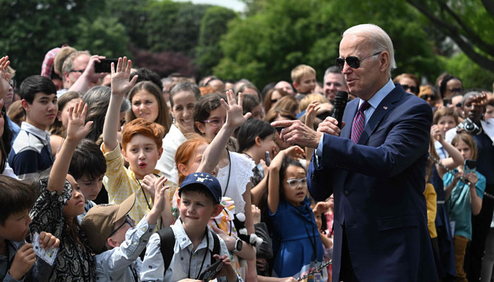 US President Joe Biden participates in a Take Your Child to Work Day welcome on the South Lawn of the White House, April 27, 2023, in Washington, DC. — AFP