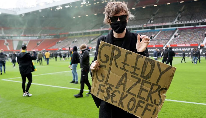 Manchester United fans protest against their owners. — Reuters/File