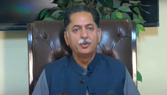 Federal minister Javed Latif speaks during a presser in Lahore on May 1, 2023, in this still taken from a video. — YouTube/PTV News Live