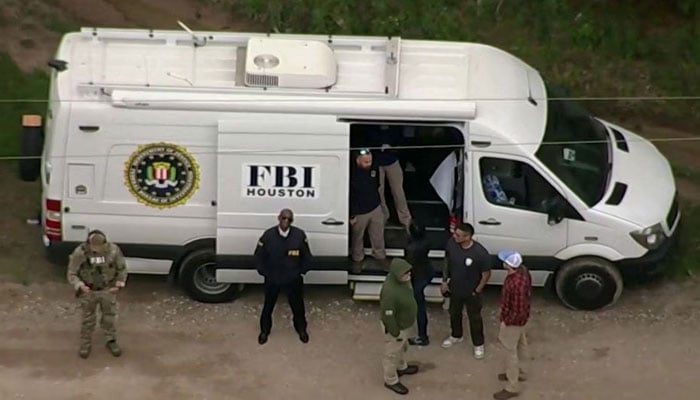 An aerial view shows a Federal Bureau of Investigation (FBI) van where a search is being conducted for Francisco Oropeza, 38, who police say shot dead five neighbours in Cleveland, Texas, US April 29, 2023, in a still image from video. — Reuters