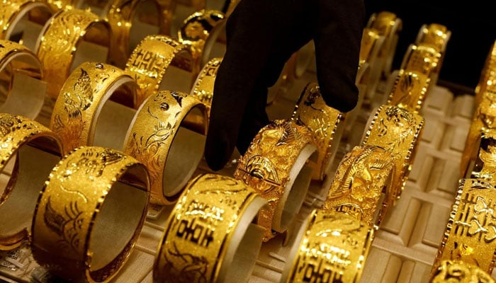 Gold jewellery is displayed at a store in this undated file photo. — Reuters