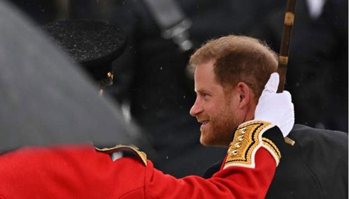 Photo: Prince Harry walks into Westminster Abbey for the first time