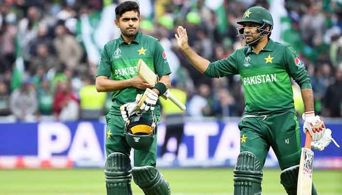 Pakistans Babar Azam (left) and Sarfaraz Ahmad celebrate their victory against New Zealand at Edgbaston in Birmingham. — AFP/File