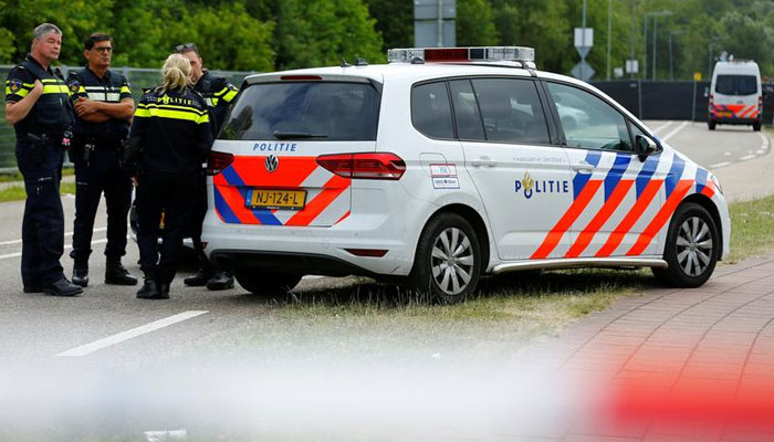Police are seen near an incident scene where a van struck people after a concert in Landgraaf, the Netherlands on June 18, 2018. — Reuters