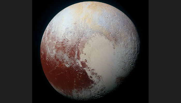 Enhanced colour global view of Pluto, taken when NASA’s New Horizons spacecraft was 280,000 miles (450,000 kilometers) away. — Nasa/File