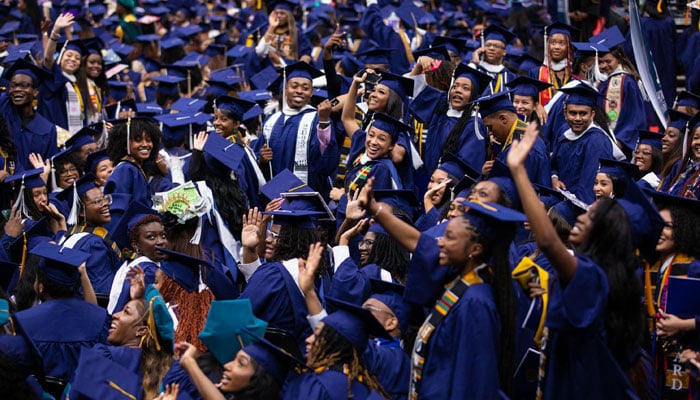 Howard University graduates arrive for the 2023 Commencement Ceremony at Capitol One Arena on May 13, 2023 in Washington, DC. — AFP