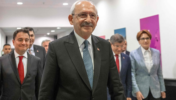 Kemal Kilicdaroglu (C) the 74-year-old leader of the center-left, pro-secular Republican Peoples Party, or CHP, arrives for a press conference in Ankara on May 15, 2023. — AFP