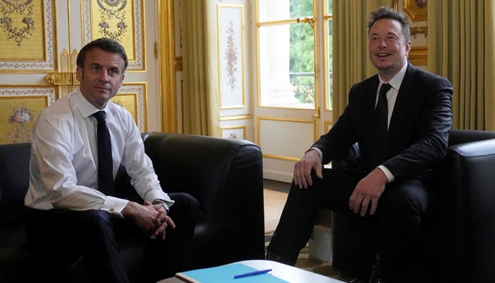 SpaceX, Twitter and electric car maker Tesla CEO Elon Musk meets France´s President Emmanuel Macron (L) at the Elysee presidential palace in Paris on May 15, 2023. — AFP