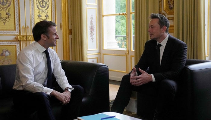 SpaceX, Twitter and electric car maker Tesla CEO Elon Musk meets with Frances President Emmanuel Macron (left) at the Elysee presidential palace in Paris on May 15, 2023. — AFP