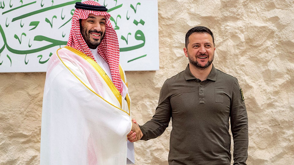 This handout picture provided by the Saudi Royal Palace on May 19, 2023 shows Saudi Crown Prince Mohammed bin Salman (left) shaking hands with Ukraine´s President Volodymyr Zelensky prior to the Arab Summit meeting in Jeddah. — AFP