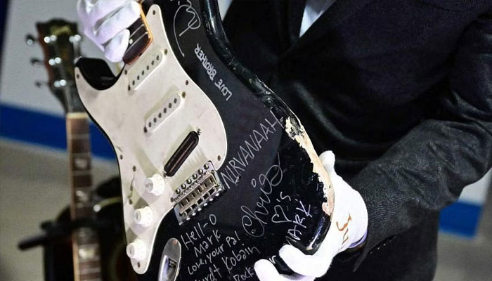 Kurt Cobains smashed Nevermind-era guitar sells at auction
