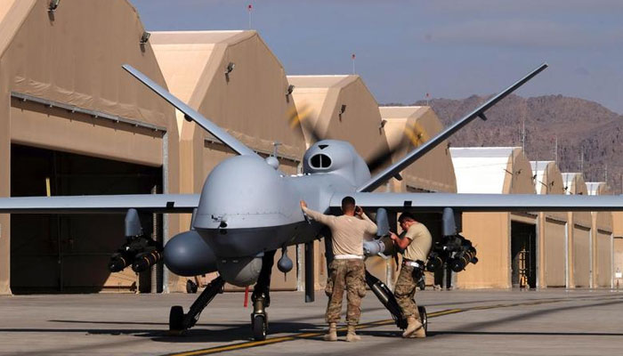 U.S. airmen prepare a U.S. Air Force MQ-9 Reaper drone as it leaves on a mission at Kandahar Air Field, Afghanistan. — Reuters/File