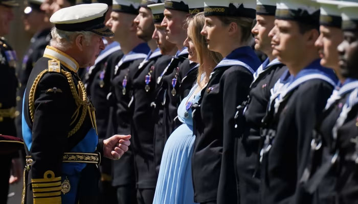 King Charles personally presents medals to sailors for role in late mother’s funeral