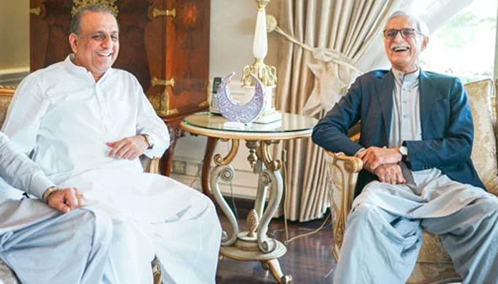 Aleem Khan (left) and Jahangir Khan Tareen are sharing a light moment during a meeting. — Facebook/Jahangir Khan Tareen/File