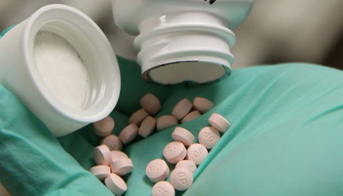 A pharmacist fills a prescription at the Rock Canyon pharmacy in Provo, Utah, US. — Reuters/File