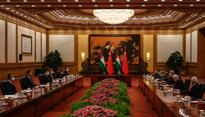 Palestinian President Mahmud Abbas (second right) attends a meeting with Chinas President Xi Jinping (second left) at the Great Hall of the People in Beijing on June 14, 2023. — AFP