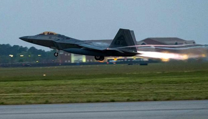 An F-22 Raptor, assigned to the 94th Fighter Squadron, takes flight to Powidz Air Base, Poland, Apr. 6, 2023. US Air Force photo by Senior Airman Chloe Shanes