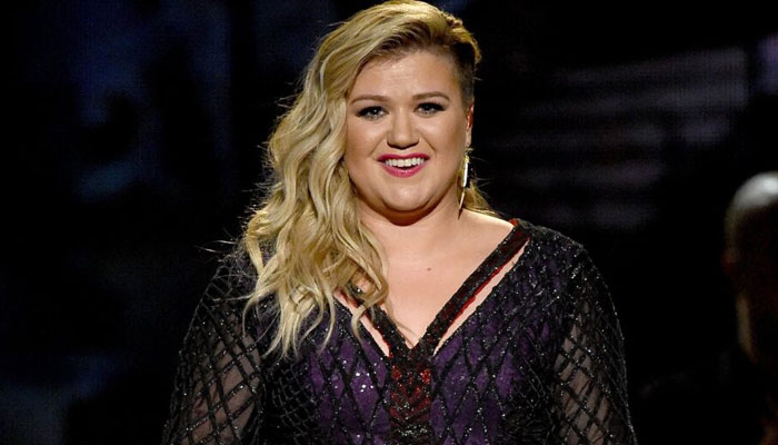 Kelly Clarkson talks ‘exhaustion’ over ‘trying to make everything bad shine’