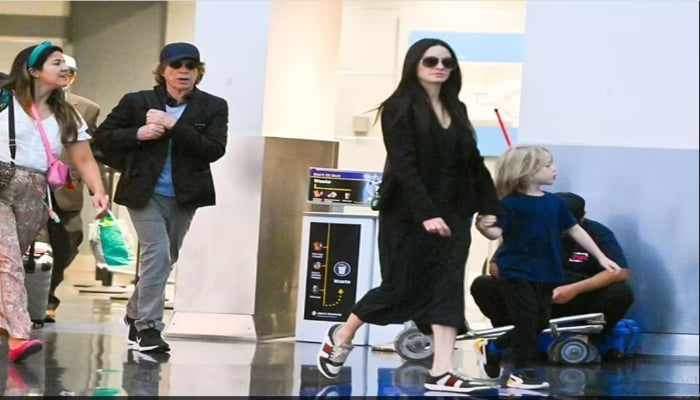 Sir Mick Jagger, Melanie Hamrick exude couple goals at JFK airport