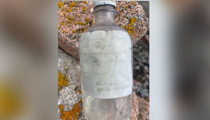 The image shows a message in the bottle that was found at a beach by a Canadian woman on June 6, 2023. — Facebook/Trudy Shattler Mckinnon