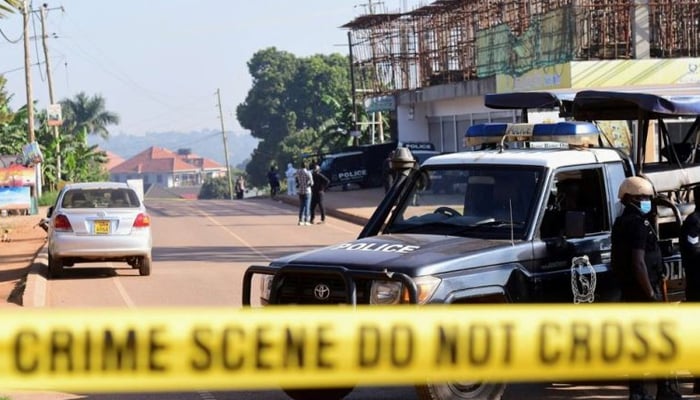 Members of the Ugandan police guarding a crime scene. — Reuters/File