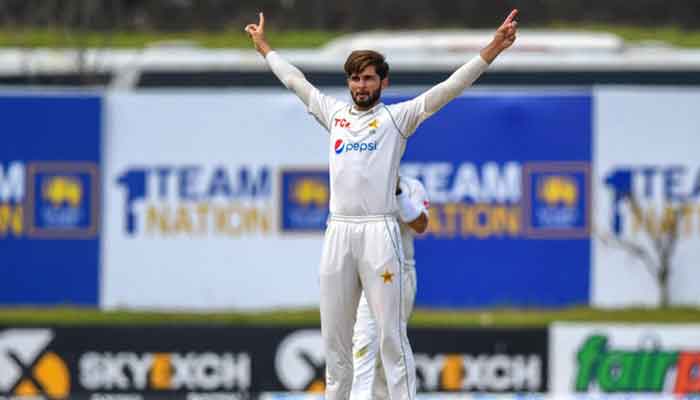 Shaheen Shah Afridi celebrates after taking the wicket during the first day of the first cricket Test match between Sri Lanka and Pakistan in Galle, Sri Lanka on July 16, 2022. —AFP/File