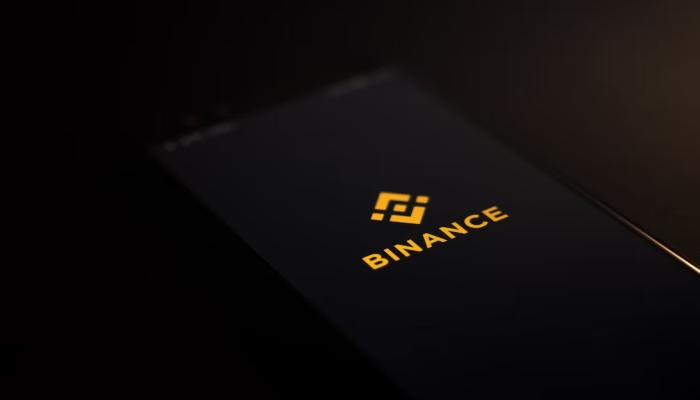 This representational picture shows the Binance logo displayed on a smartphone screen. — Unsplash/File